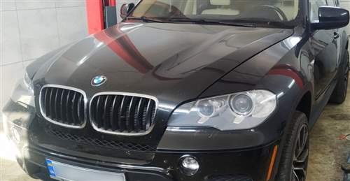 Замена натяжителя ролика приводного ремня на BMW X5 (E70) 4.8i